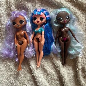 Three LOL OMG Dolls